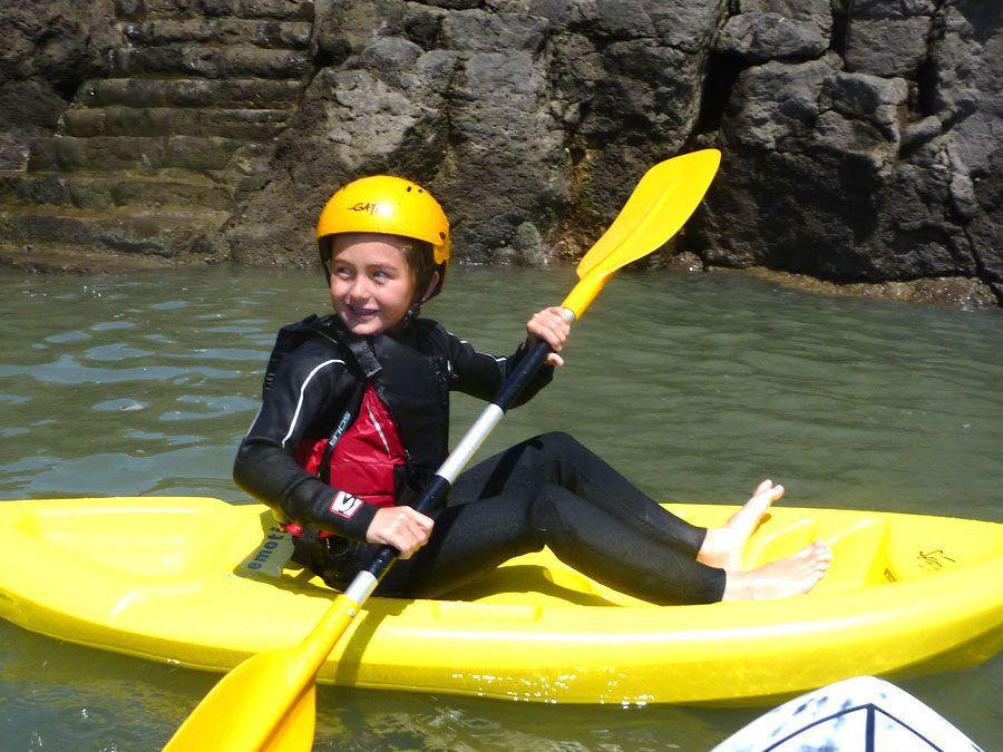 Child Surf Kayaking with Adventures Wales Child Surf Kayaking with Adventures Wales